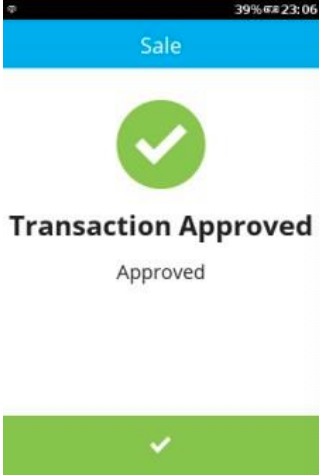 transaction approved message on terminal screen with large green tick